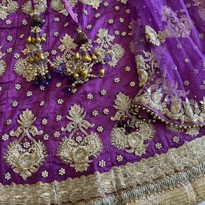 Royal purple and gold lehenga